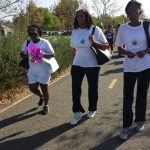 People walking on a road for the end Alzheimer's walk event
